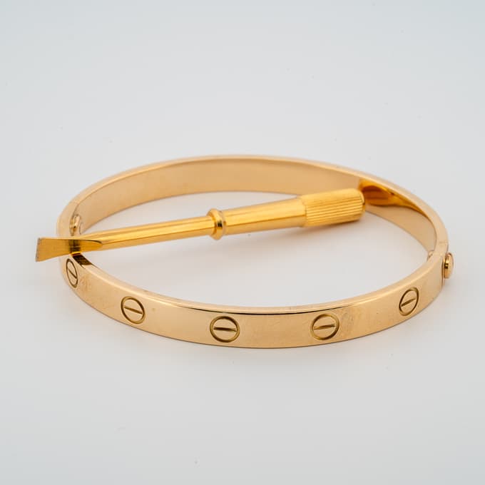 18 karat yellow gold classic Cartier Love bracelet in Overland Park Kansas