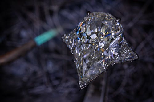10 Carat Pear Shaped Diamond in front of our welding torch on jewelers bench