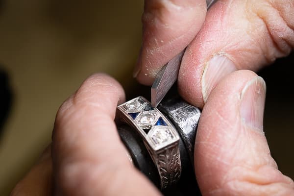 Antique sapphire ring in platinum with custom cut sapphire being reset