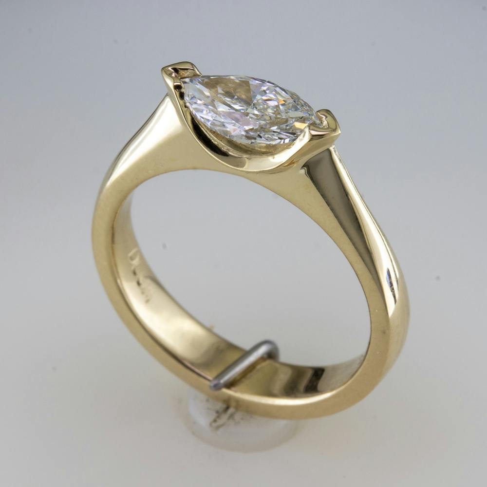 East-West Marquise diamond engagement ring side view