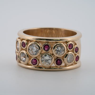 Round ruby and diamond wide band in yellow gold top view