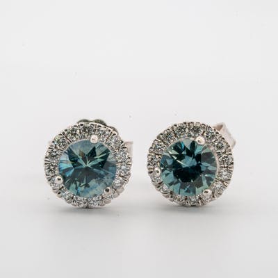 Montana blue sapphire halo earrings front view