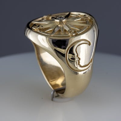 View of custom marine compass ring with the moon
