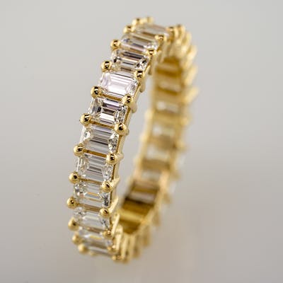 Another side view of emerald cut eternity band
