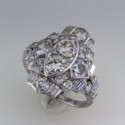 Platinum diamond antique ring side view